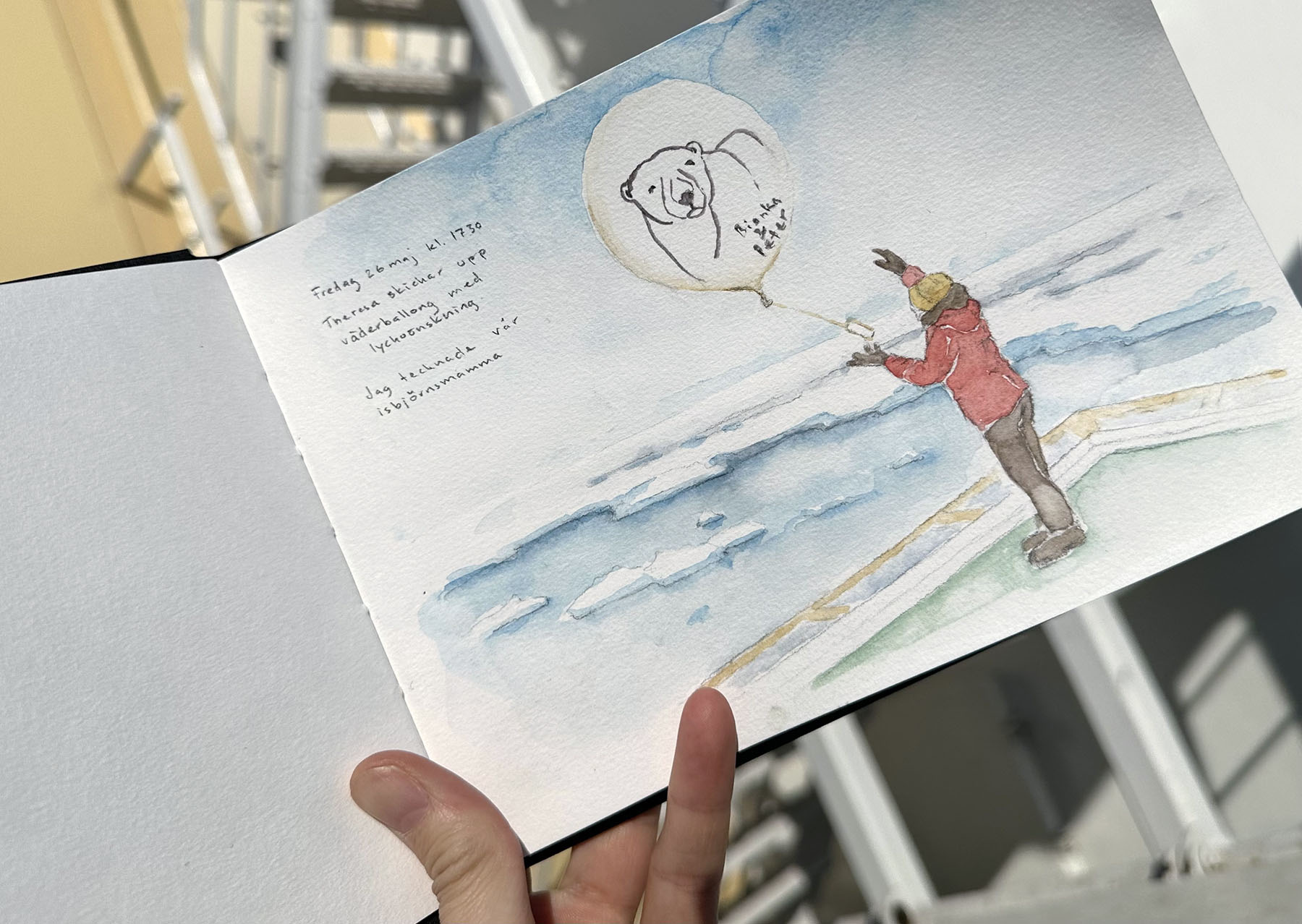 Teckning/akvarell av person som släpper en väderballong.